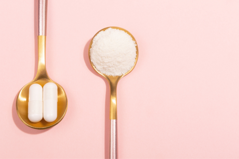 Collagen tablet and powder forms on spoons