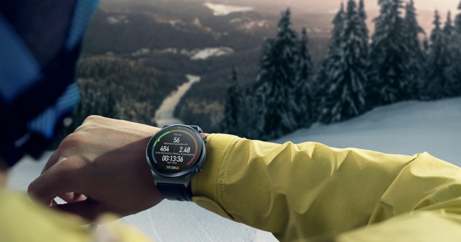 Person holding up Huawei Watch GT 2 Pro on wrist while skiing 