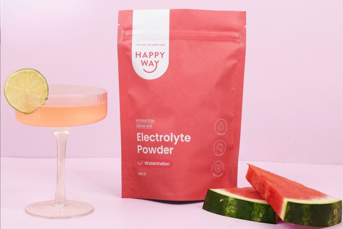 Happy Way Electrolyte Water Watermelon in a glass