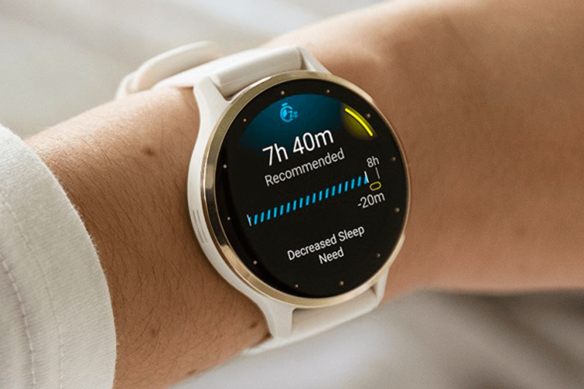 Woman wearing a Garmin Venu 3 smartwatch showing sleep information