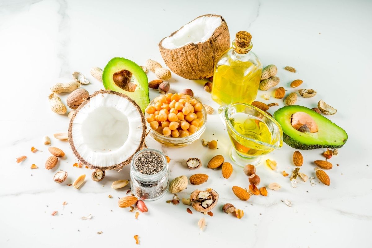 Healthy fats including avocado, olive oil, nuts and seeds