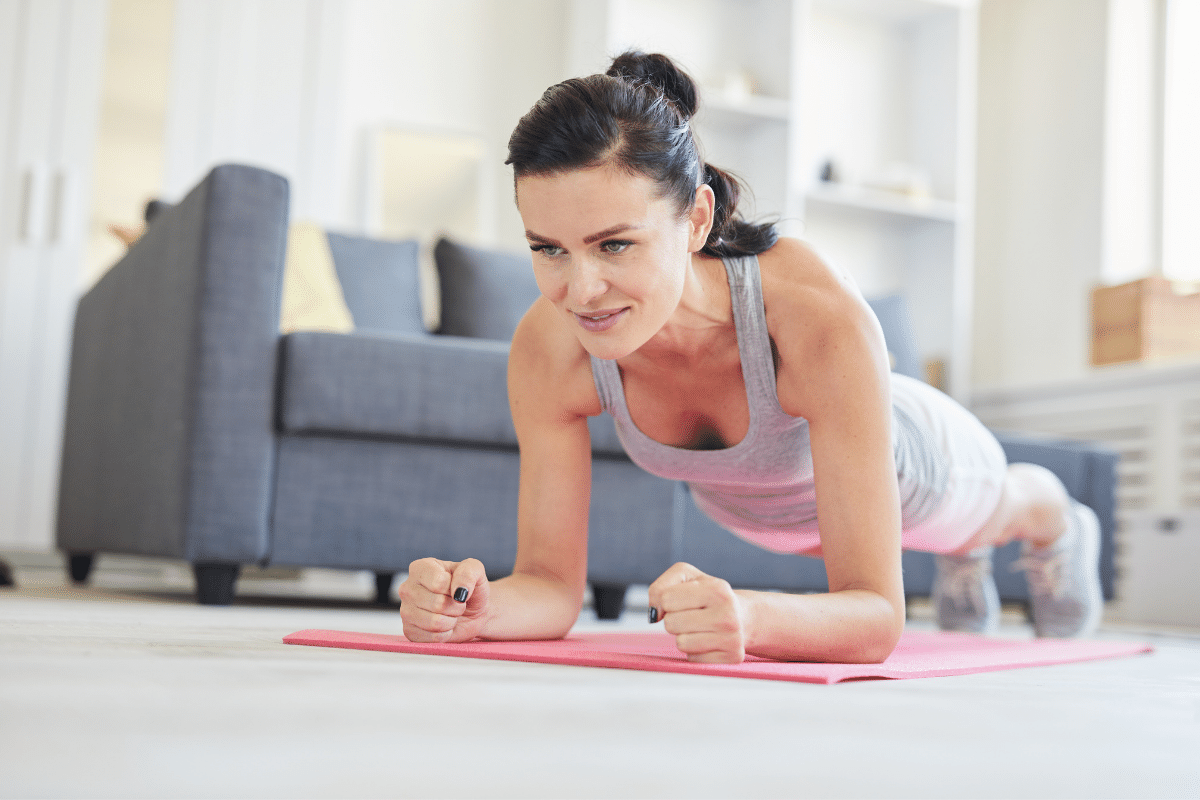 women doing plank at home