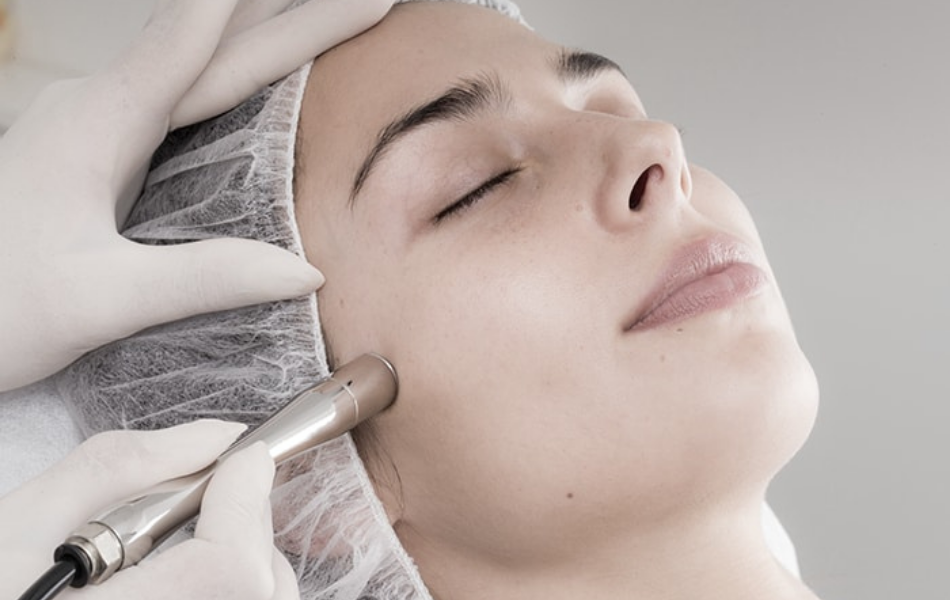 Woman getting microdermabrasion