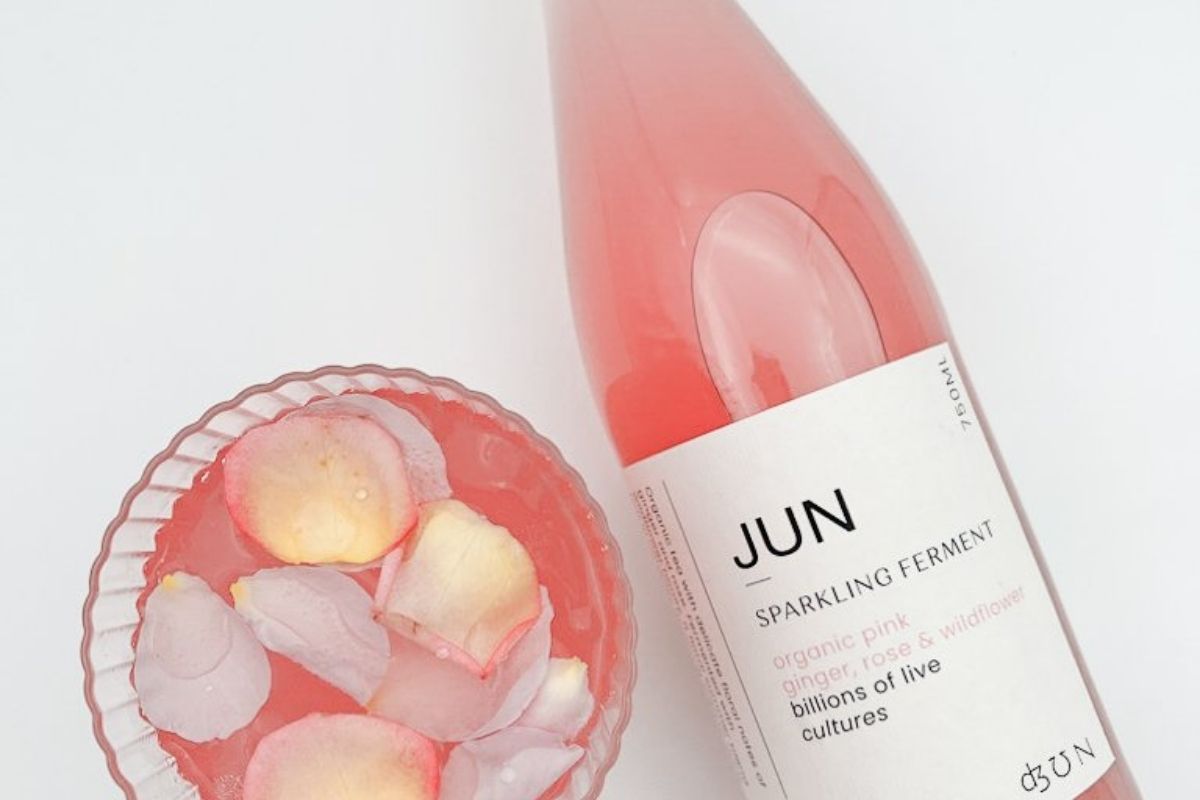 Source Botanics Pink Jun in a glass with ice
