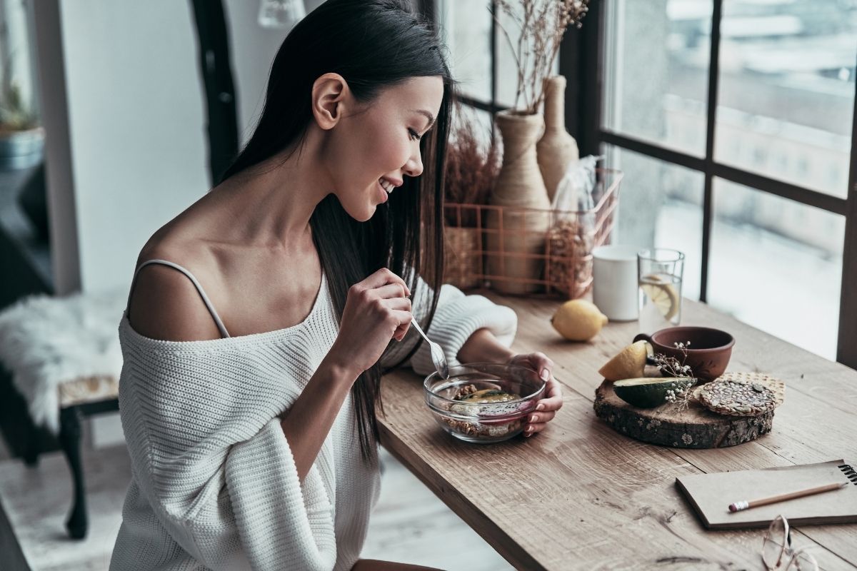 Woman eating breakfast